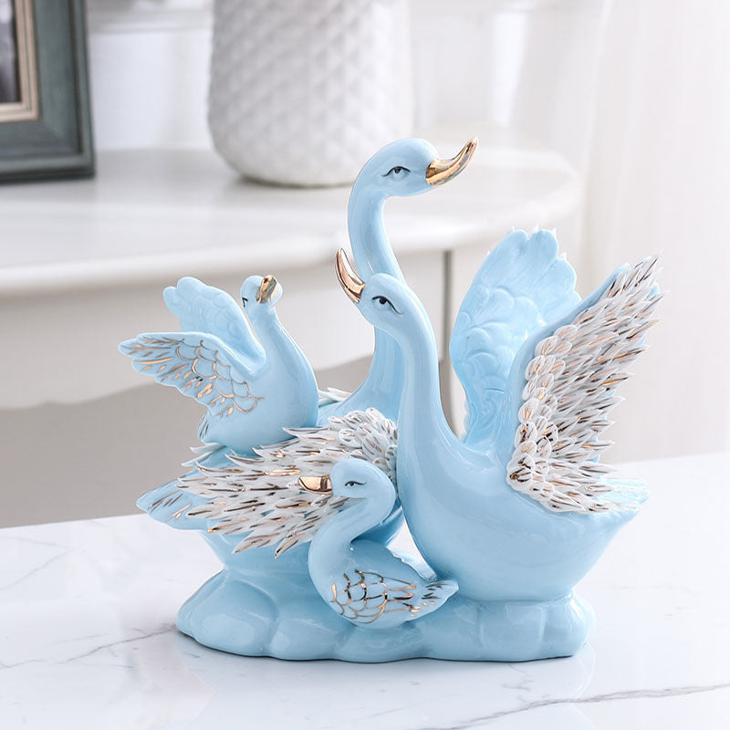 Grace in Motion – Ceramic Swan Family Sculpture