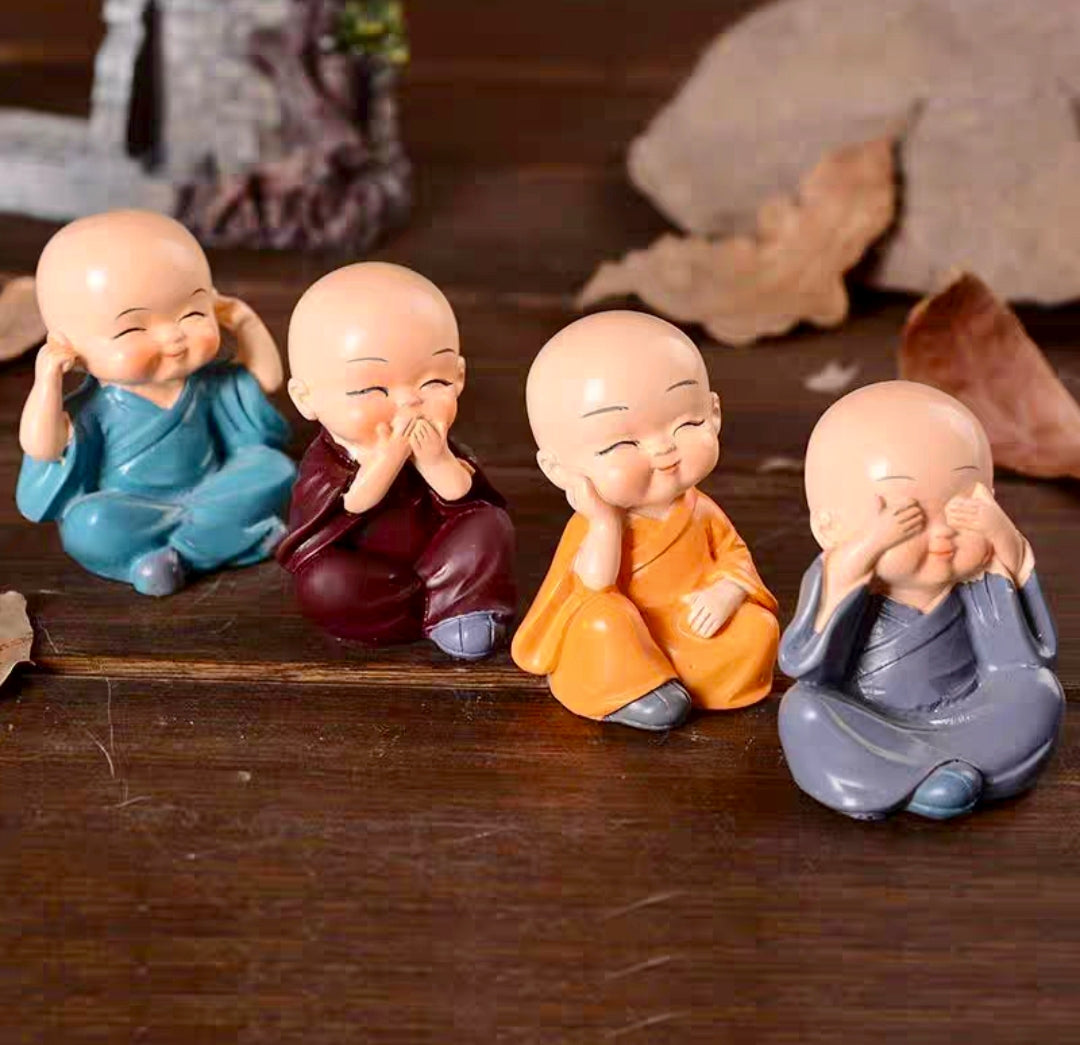 Whispered Wisdom – Monk Quartet Figurines