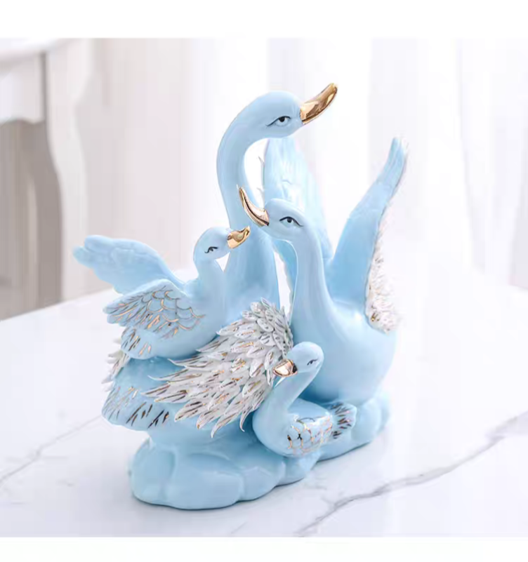 Grace in Motion – Ceramic Swan Family Sculpture