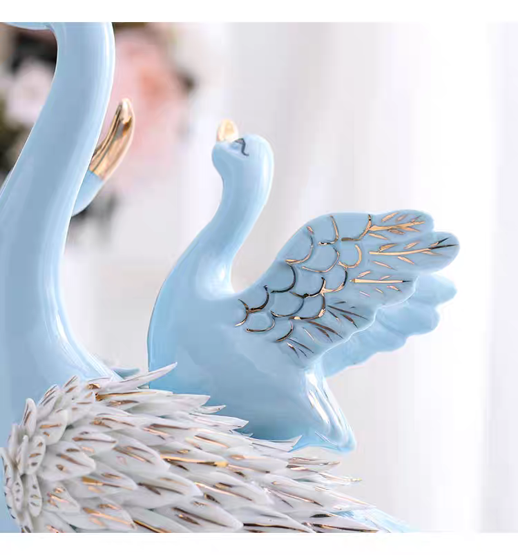Grace in Motion – Ceramic Swan Family Sculpture