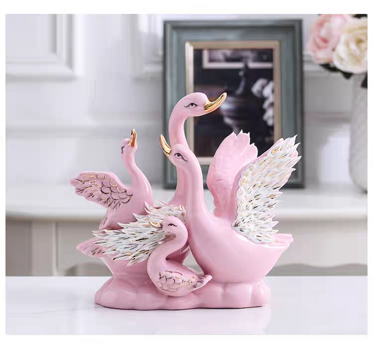 Grace in Motion – Ceramic Swan Family Sculpture