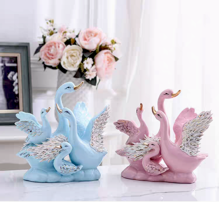 Grace in Motion – Ceramic Swan Family Sculpture